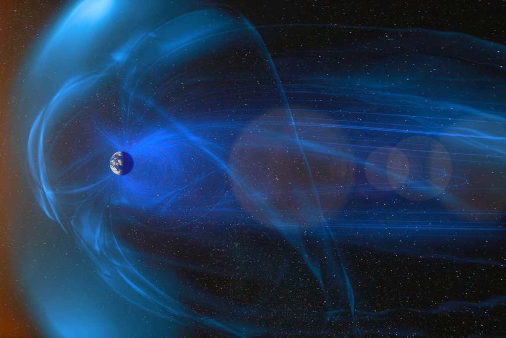 Die Erde umgeben von einem blauen Magnetfeld